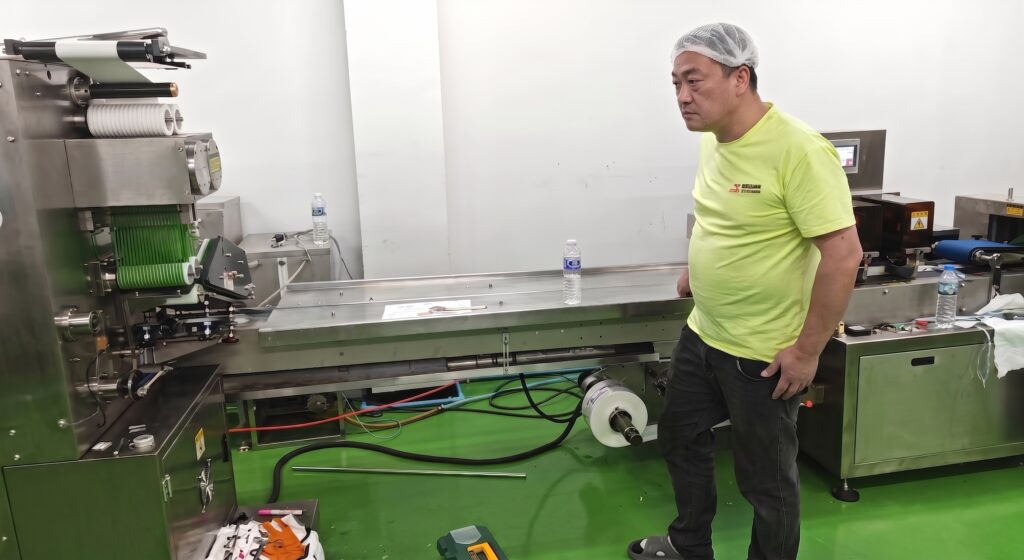 ZXJ engineer commissioning portable wet wipes machine during overseas after-sales service