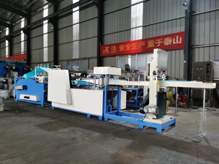 Dental bibs converting machine for producing disposable dental bibs