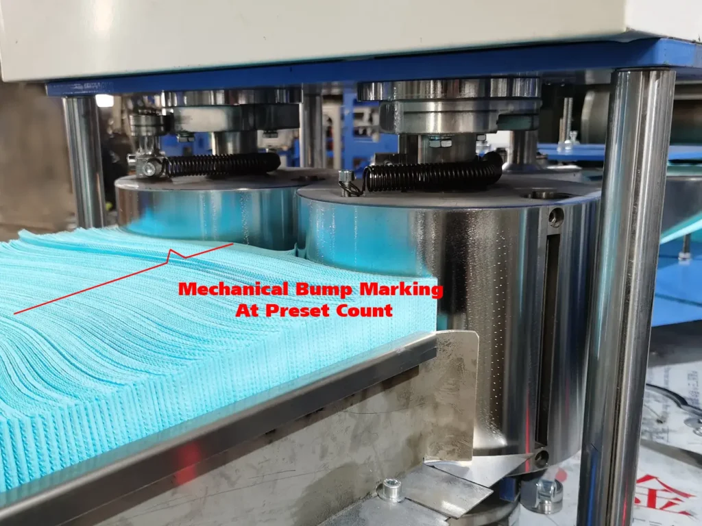 Dental bibs machine Automated Counting Mechanical bump marking at preset count
