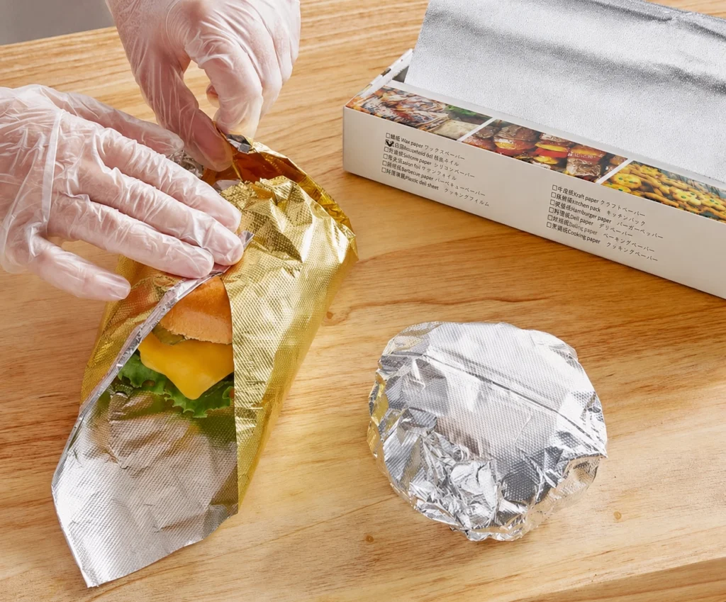 Interfolded pop-up aluminum foil sheets stacked for food service