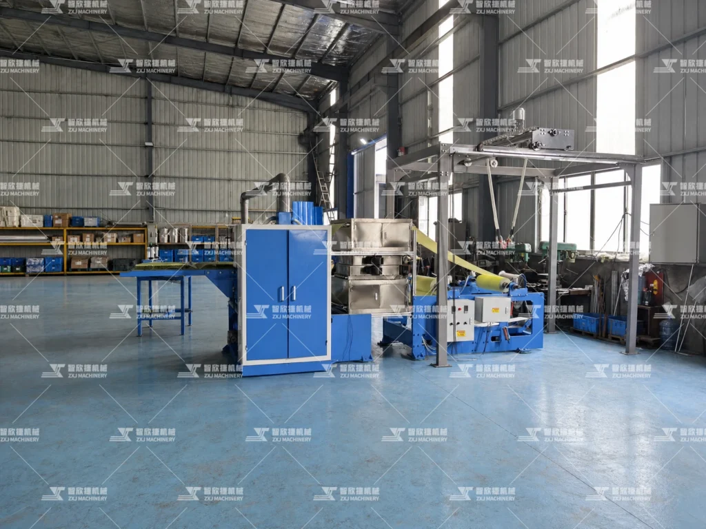 Side view of our pop-up oil-absorbing paper folding machine, showing the feeding, folding and conveying sections in the factory.