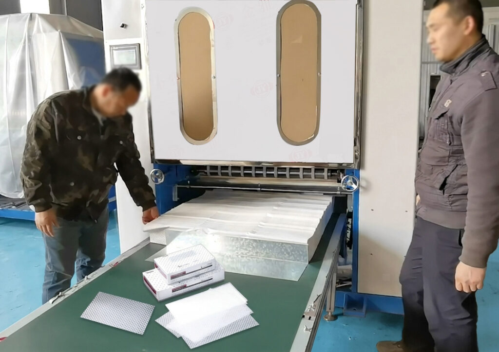pop-up perm paper sheets produced during a perm paper folding machine test run