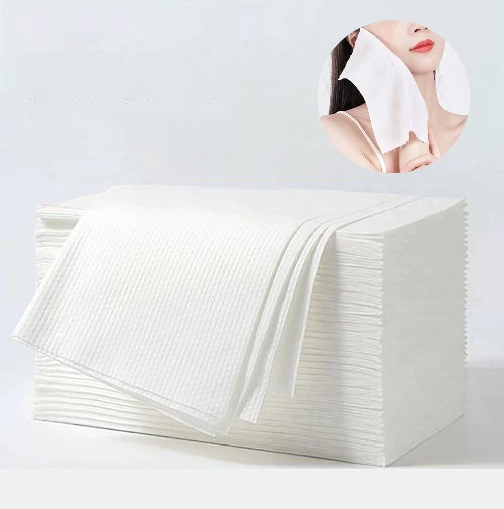 Folded disposable non-woven facial cleansing towel, spunlace material