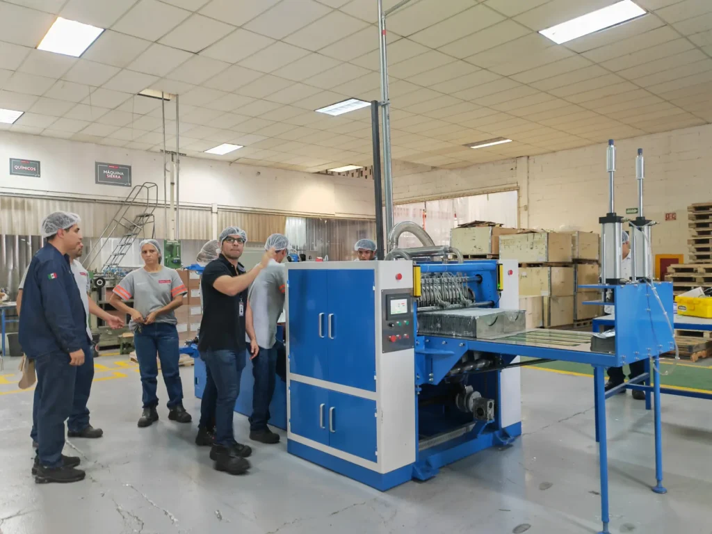 ZXJ Machinery aluminum foil folding machine in operation at Mexico factory - successfully passed Mexican government safety production inspection and compliance verification