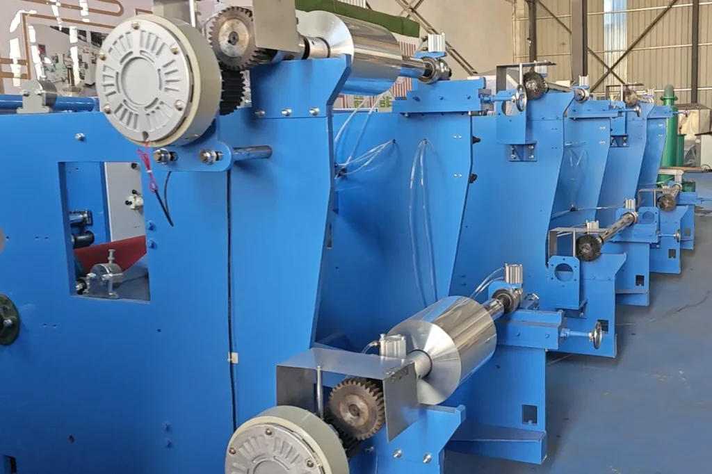 Magnetic powder brake tension unwinding system on a pop-up aluminum foil folding machine-zxj machinery