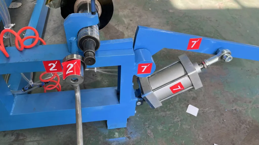 Close-up view of the ZXJ emergency blanket folding machine showing the heavy-duty steel construction and reinforced materials.