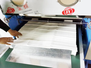 out put of Pre-cut pop-up deli paper making machine for food wrapping and bakery use, produced by ZXJ Machinery.