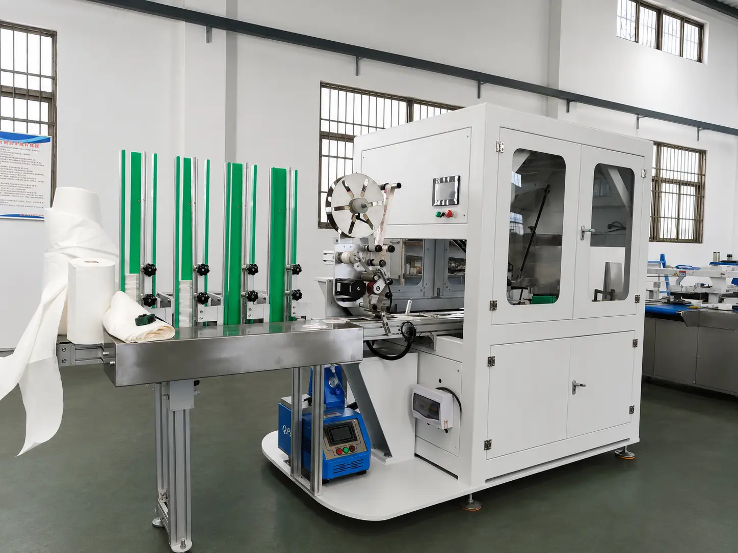 wet wipes making machine - Automatic manipulator capping machine