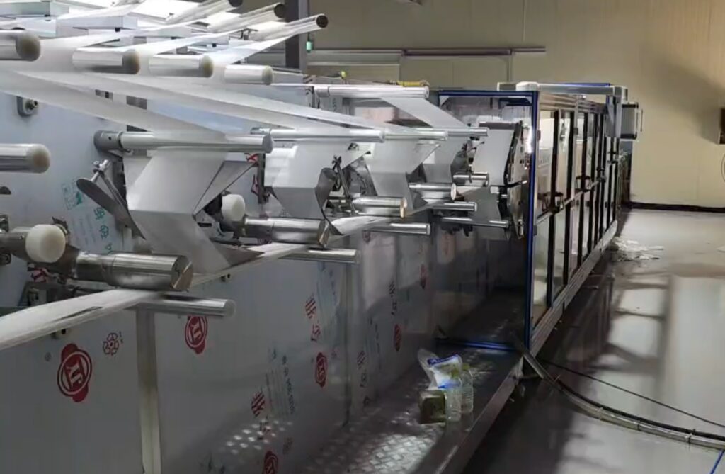 ZXJ Machinery engineer assembling a 12-lane wet wipes production line in South Korea.